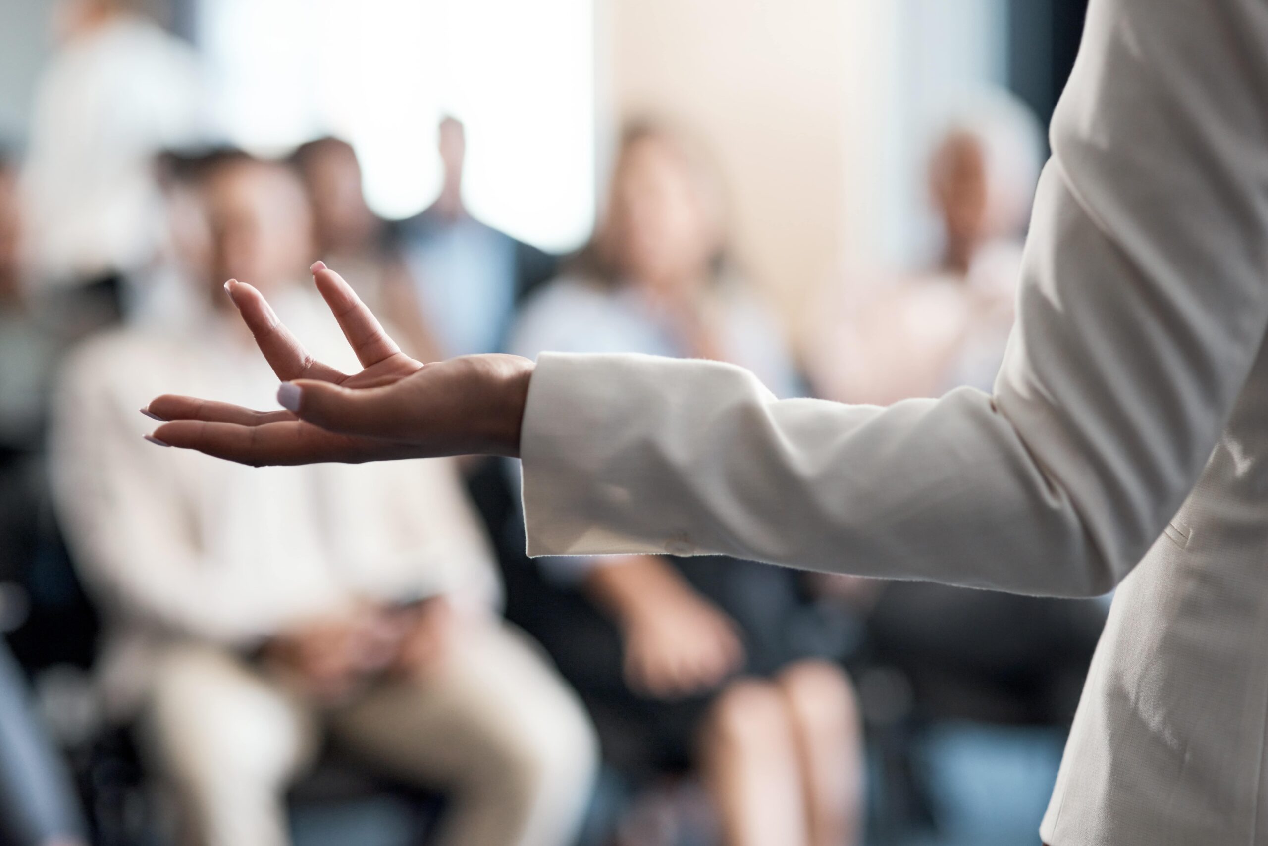 Attendees listening to keynote speech at conference
